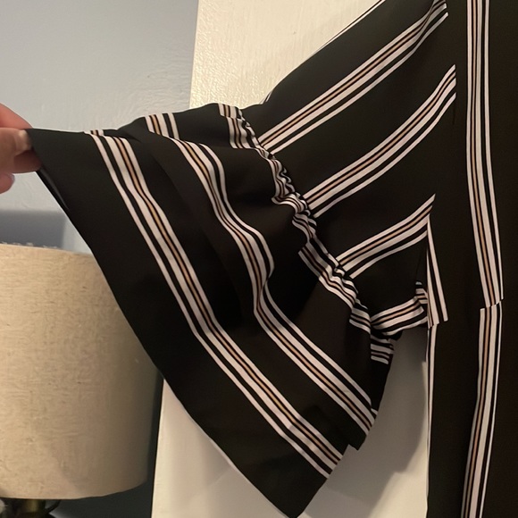 Striped dress with ruffle details - Picture 6 of 7